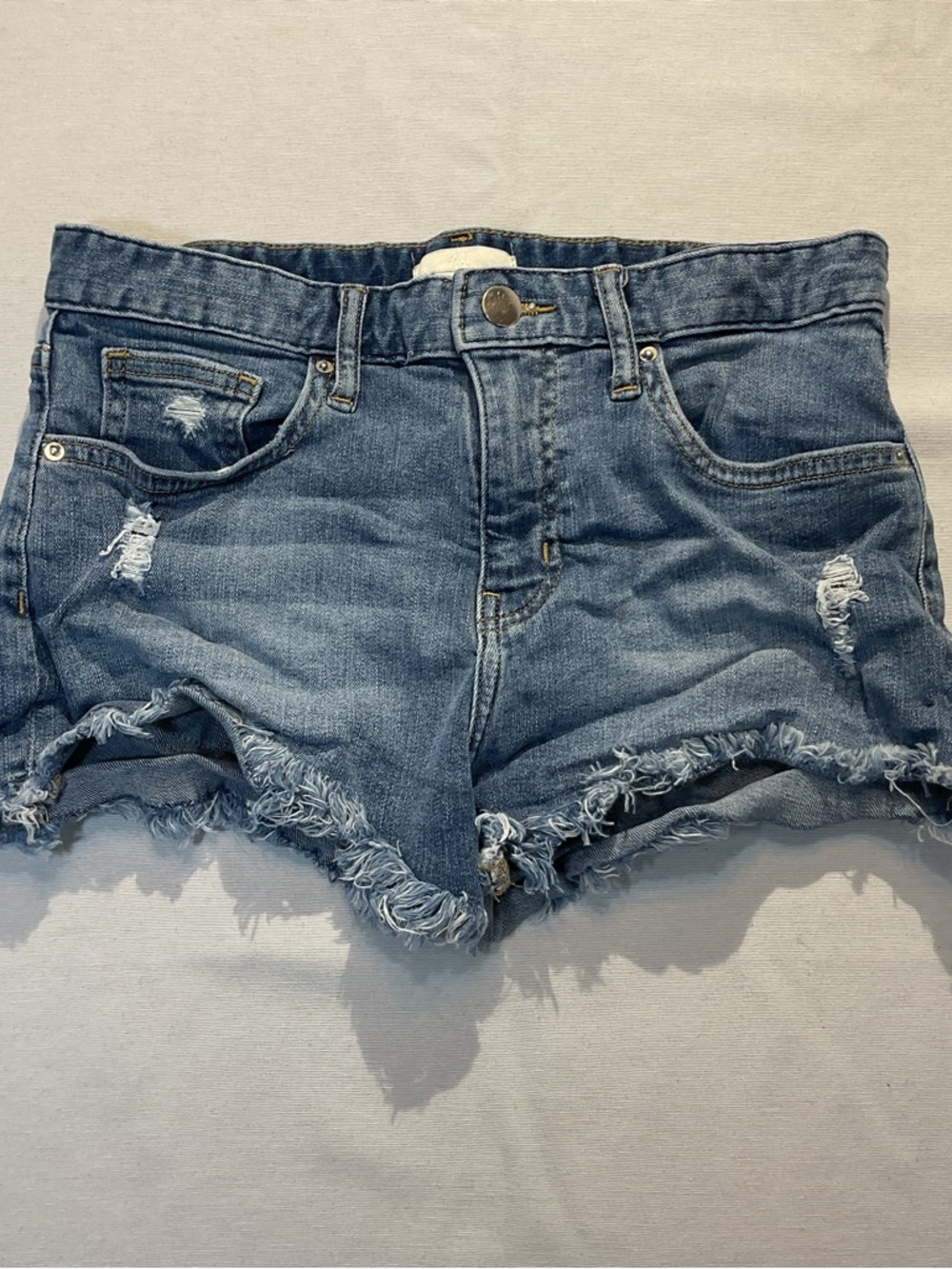 H&M Distressed Cutoff Denim Blue Jean Shorts‎ Size 2 Raw Hem Mid-Rise